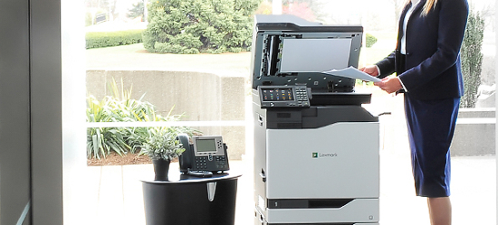 Multi function printer being used in an office 