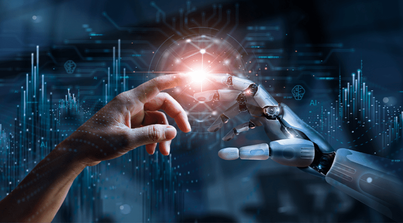A human hand and a robot hand touching.
