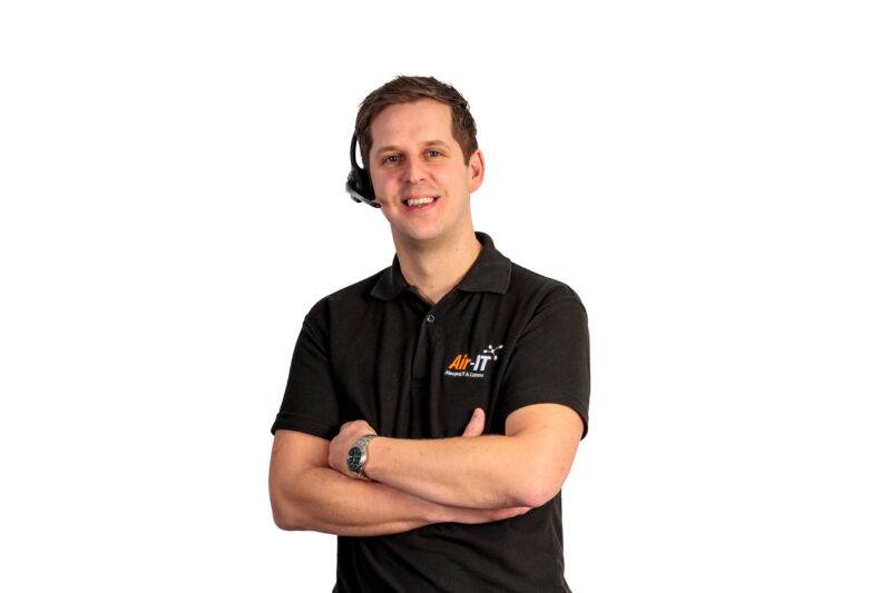 Air IT employee with headset on