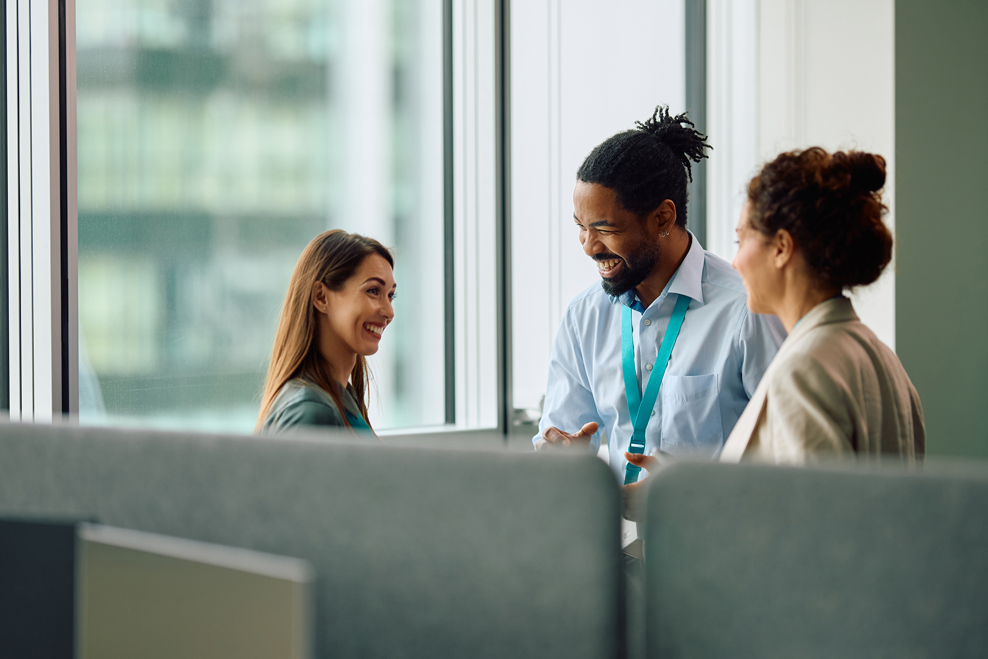 https://www.airit.co.uk/wp-content/uploads/2026/05/happy-multiracial-busines-team-talking-while-worki-2026-03-16-03-28-45-utc.jpg